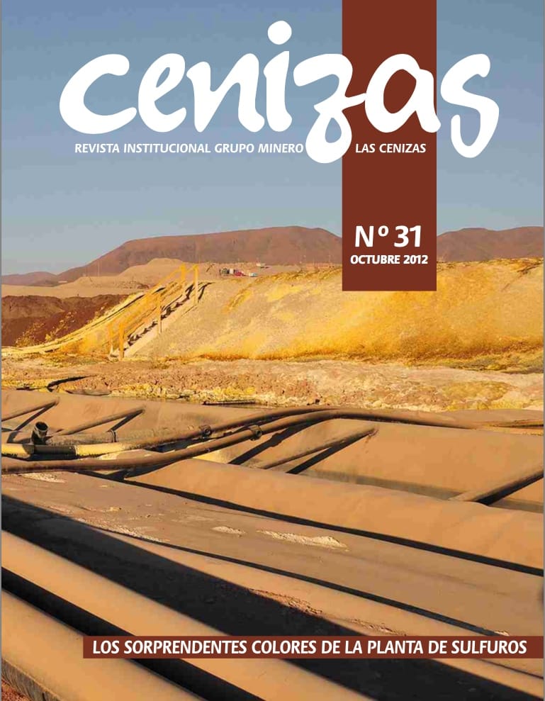 Portada revista minera con paisaje industrial y tuberías