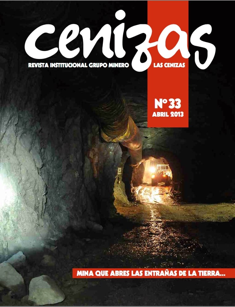 Portada revista minera con túnel y maquinaria subterránea